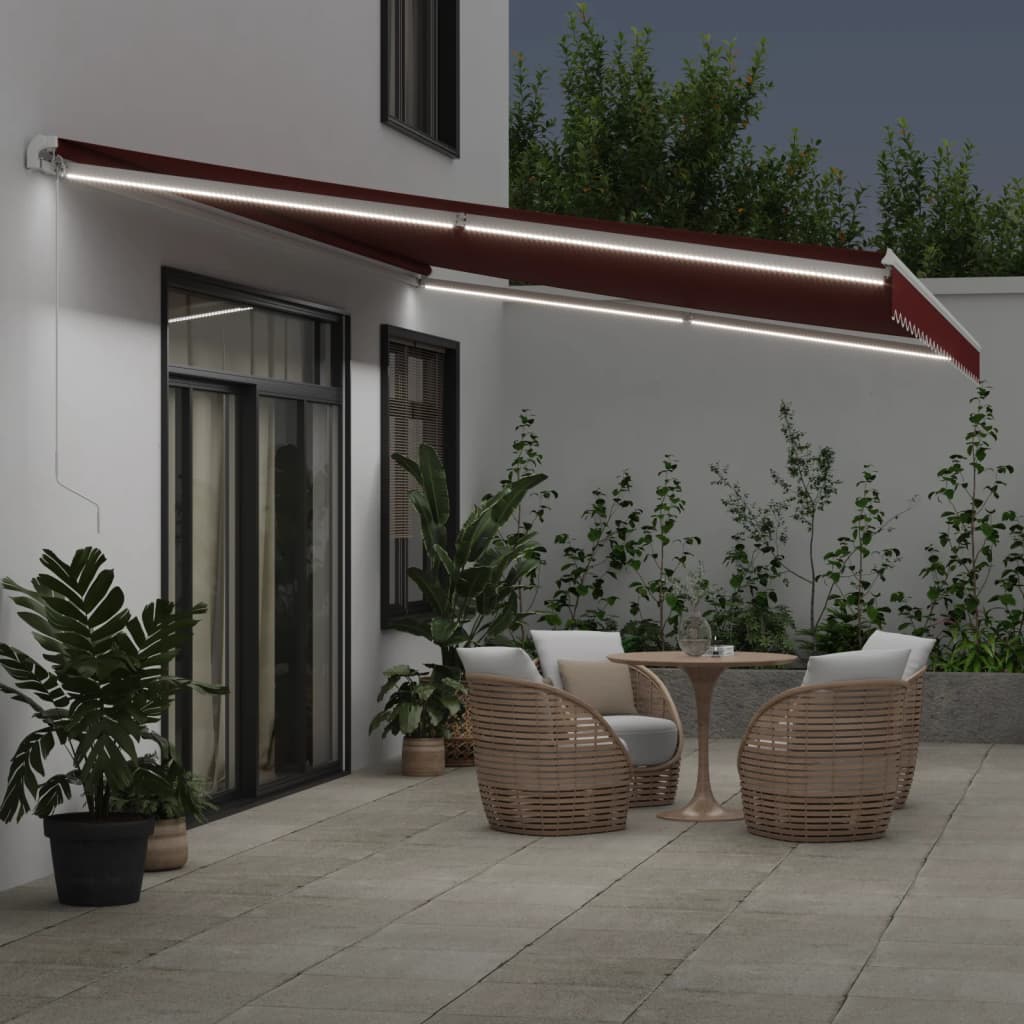 vidaXL Manual Retractable Awning with LED Burgundy 600x350 cm