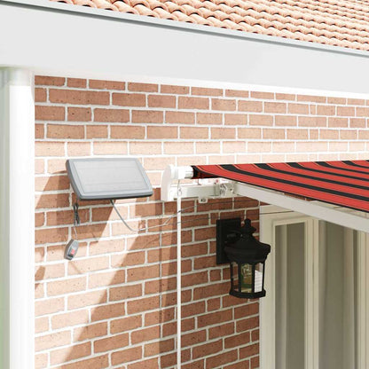 vidaXL Retractable Awning Orange and brown 600 x 300 cm